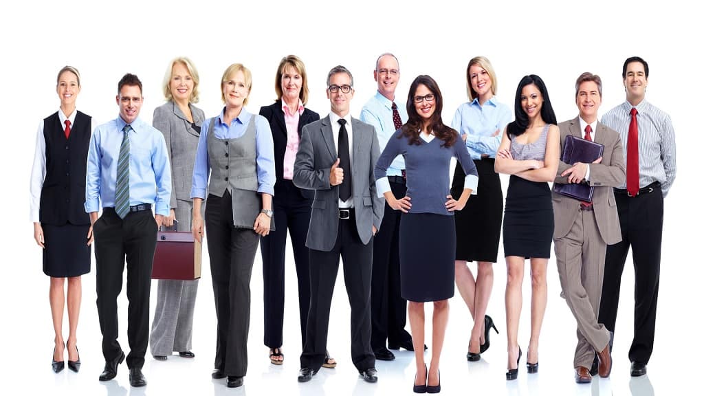 Menschen die zusammen stehen und alle ein Business-Outfit tragen